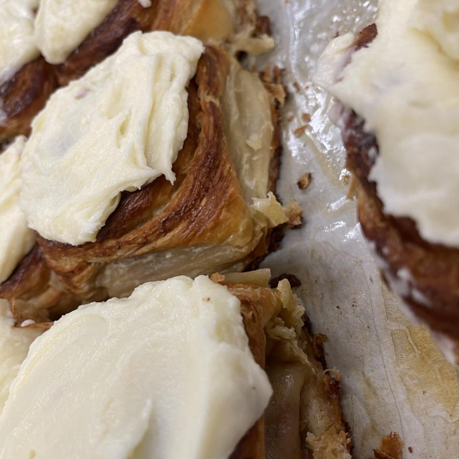 Cinnamon rolls finished with cream cheese frosting