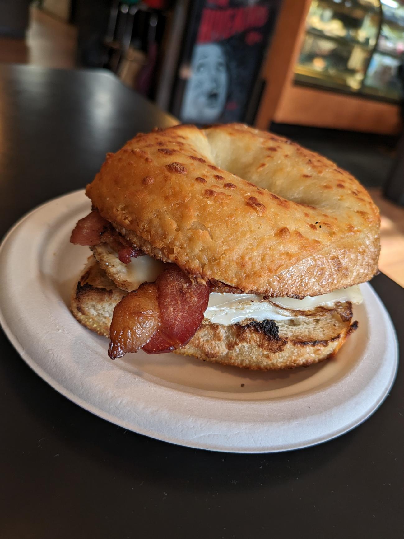 Asiago bagel LVLUP with bacon, egg, and cheese
