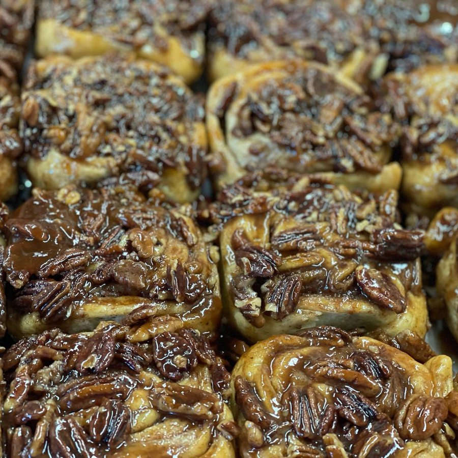 Sticky buns covered in pecans and caramel